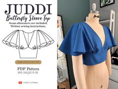 a mannequin wearing a blue top with ruffles