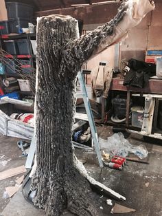 a tree that has been cut down and is in the process of being worked on