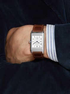 Find JAEGER-LECOULTRE Reverso Classic Large 27mm Stainless Steel And Leather Watch on Editorialist. The story of how JAEGER LeCOULTRE's iconic 'Reverso' watch came to be created in 1931 is legendary. After British Army officers based in India grew tired of finding their watch faces smashed at the end of polo games, Mr Jacques-David LeCoultre was presented with the challenge of designing something more durable. This 27mm stainless steel model features the signature Art Deco-inspired squared case, which is fitted with a 55-part flip mechanism that allows you to easily twist the silver guilloché dial and safely hide it away. Powered by the hand-wound calibre 822/2 movement, it's built with a second-counting sub-dial function and impressive 45-hour power reserve. For warranty information, plea Reverso Watch, Jaeger Lecoultre Reverso, Jaeger Lecoultre Watches, Tank Watch, Mens Watches Leather, Wrist Candy, Jaeger Lecoultre, Mens Lifestyle, Mens Designer Fashion