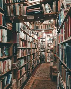 a long row of bookshelves filled with lots of books