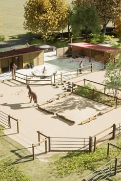 an aerial view of a horse farm with horses