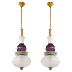 pair of murano glass and brass pendant lights