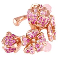 Experience the enchantment of the "Pink Cherry Blossom" jewelry pieces, where the essence of nature is captured in the luminous embrace of 18k pink gold. Each delicate petal, fashioned from the soft hues of pink sapphires, is adorned with brilliant diamond pistils, radiating a timeless allure. The carved pink opal buds, intricately detailed on the ear cuff, add a touch of enchantment, infusing every moment with the delicate fragrance of spring. Indulge in the joy of wearing this exquisite piece, allowing the magic of cherry blossoms to accompany you on your journey. Let their eternal bloom evoke a sense of renewal and celebration, reminding you of the enduring beauty that surrounds us in every season of life. This Cherry Blossom ear cuff offers the beauty of blossoms without the need for p Cherry Blossom Bouquet, Cherry Blossom Jewelry, Blossom Bouquet, Pink Cherry Blossom, Pink Cherry, Jewelry Tree, Pink Opal, Brilliant Diamond, Sapphire Diamond