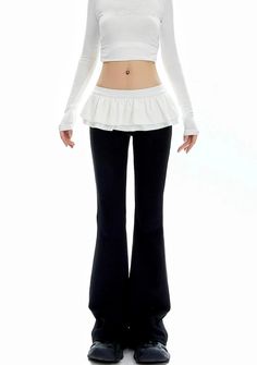 Discover the essence of effortless style with our Bell Bottom Ruffle Waistband Skirt-Pants, where comfort meets chic. Made with a blend of premium fabrics, these skirt-pants feature a unique ruffle waistband that adds a touch of whimsy to your ensemble. The thoughtful design boasts bell-bottom flares for a leg-elongating effect and a refreshingly light fabric that makes summer heat bearable. Its airy silhouette and black color ensure it pairs perfectly with tops of any style for a look that's mo Skirt With Pants, Grunge Accessories, Ballet Style, Ballet Fashion, Sweatshirt Set, Bell Bottom, Sweatshirt Dress, Fold Over, Flare Pants