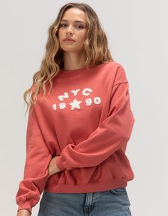 Bdg Urban Outfitters Nyc Applique Crewneck Sweatshirt. Throwback Vibes In This Pullover Sweatshirt With An Nyc 1990 Applique Graphic. Soft And Stretchy Knit. Cuffed Long Sleeves And Hem. Oversized Fit. 100% Cotton. Machine Wash. Imported. Model Is Wearing A Size Small. Model Measurements:height: 5'9" Bust: 32"waist: 25"hips: 35" Vintage Ribbed Cuffs Top For Spring, Fall Graphic Print Drop Shoulder Top, Vintage Tops With Ribbed Cuffs For Spring, Oversized Tops For College In Fall, Retro Crew Neck Tops For Fall, Oversized Fall Tops For College, Trendy Drop Shoulder Tops With Ribbed Cuffs, Trendy Drop Shoulder Top With Ribbed Cuffs, Trendy Tops With Ribbed Cuffs And Drop Shoulder