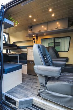 the interior of an rv with couches and storage area in place for campers