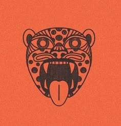 an orange background with a black and white tiger's head