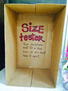 a cardboard box with the words size tester written on it