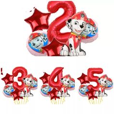 the balloons are shaped like numbers and have dogs on them, including one with a balloon