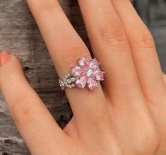 Pink Cherry Blossom Ring Item Weight: 5.98g Main Stone: CITRINE Metals Type: Silver Shape\pattern: Cherry Blossom Size: 6, 7, 8, 9, 10 Pink Flower Ring, Cherry Blossom Ring, Kawaii Store, Pink Cherry Blossom, Pink Cherry, Girly Accessories, Classy Jewelry, Expensive Jewelry, Fancy Jewellery