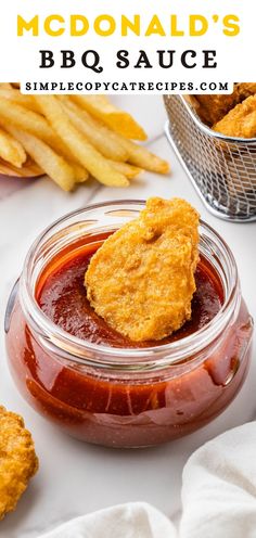 homemade mcdonald's bbq sauce in a jar with fried chicken nuggies