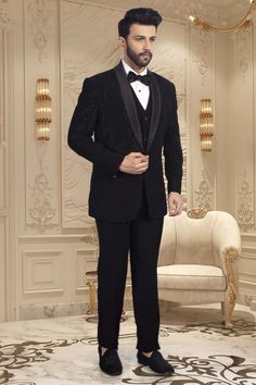 This TUXEDO- R14-S63 showcases stunning black cutdana embroidery, adding a touch of elegance and sophistication to your ensemble. Expertly crafted with precision and attention to detail, this tuxedo is the perfect choice for any formal occasion. Its intricate design is sure to make you stand out in the crowd. Luxury Fitted Sherwani For Semi-formal Occasions, Tailored Evening Party Wear Suits, Elegant Tuxedo For Black-tie Festive Events, Elegant Tuxedo For Gala And Festive Occasions, Luxury Fitted Suit For Festive Season, Black Tuxedo For Evening Party Wear, Black Tuxedo For Evening Party, Black Party Wear Tuxedo For Evening, Tailored Sets For Black-tie Festive Events