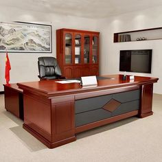 an office with a large desk and chair