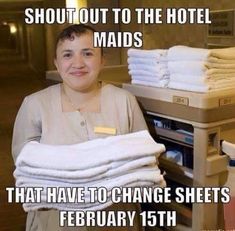 a boy is holding some folded towels in front of an oven with the words shut out to the hotel maids that have to change sheets