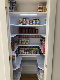 an open refrigerator with food inside of it