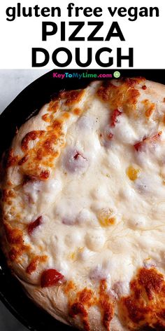 a close up of a pizza in a pan with text overlay that reads gluten free vegan pizza dough