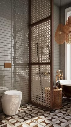 a bath room with a toilet and a bath tub next to a window in it