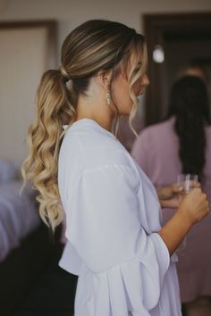 Day to Night: Transition Your Look with Versatile Ponytail Hairstyles Wedding Hairstyles Ponytail Low, Ponytails Wedding Hairstyles, Formal Curled Ponytail, Updo Bridesmaid Hair Ponytail, Wedding Hairstyle Ponytail Bride, Wedding Hairstyles Tail, Bridesmaid Curled Ponytail, Simple Bridesmaid Hair Ponytail, Long Hair Bridesmaid Styles Ponytail