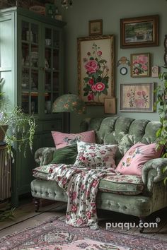 a living room filled with lots of furniture and flowers on the wall above it's couch