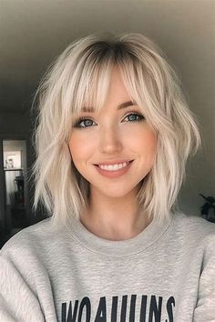 layered bob with bangs - Search Images Shaggy Bob For Thick Hair With Bangs, Curtain Bangs On Bob Haircut, Low Maintenance Haircut Bangs, Choppy Blonde Bob With Fringe, Short Platinum Hair With Bangs, Blonde Short Hair With Fringe, Inverted Bob Curtain Bangs, Bob Hair Fringe, Long Fringe Bob