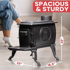 a woman sitting on a chair next to an old fashioned stove with the words spaceous and study above it