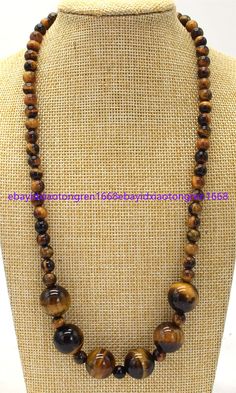 Store Categories Store Categories Other 6mm&14mm Natural Yellow Tiger's Eye Round Gemstone Beads Necklace 16-28 Inch Product Description Item Description: Size : 6mm&14mm Quantity:  1 Pcs Length: 16-28" Condition: New If you want to buy more , please contact us . Thanks ! &&&&: Sale the items does not include box.   Payment We accept only PayPal payment. A non-payment dispute will be opened if full payment is not received after 14 days of auction. Delivery details Item will be shipped within one working day after full payment is received. You should receive item within 25-30 days. Normally delivery time is about 25-30 working days. To get the shipping invoice, Just simply wait until all of the auctions have ended, and complete the checkout from the most recent Email or any auction page aft Brown Crystal Necklaces With Natural Stones And Round Beads, Brown Crystal Necklaces With Round Natural Stones, Brown Crystal Necklaces With Natural Round Beads, Brown Crystal Necklaces With Natural Stones, Brown Jewelry With 8mm Oval Beads, Brown Jewelry With 8mm Round Beads, Brown Beaded Necklaces With 8mm Round Beads, Brown Necklaces With 8mm Round Beads, Brown Gemstone Beads Round Cabochons