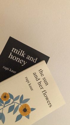 two books are stacked on top of each other, one is titled milk and honey