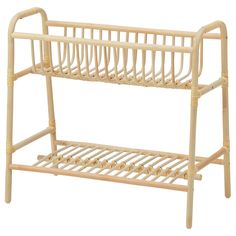 a bamboo baby crib is shown against a white background