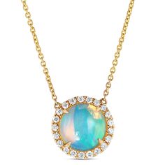 There’s something magical about opals. The way the colors and details swirl and every piece is truly unique, like looking into a tiny universe. This incredible round cut opal pendant necklace is a celebration of the magnificent opal. The center stone is surrounded by a halo of diamonds and set in 14K yellow gold. Our necklace is a true modern classic that’s sure to elevate your look for any occasion. Gold Opal Round Necklaces, Celestial Opal Round Necklace, Unique Opal Round Pendant Necklace, Multicolor Opal Round Necklace, Luxury Yellow Gold Opal Necklace, Halo Necklace, Opal Pendant Necklace, Jewelry Cleaner, Opal Pendants