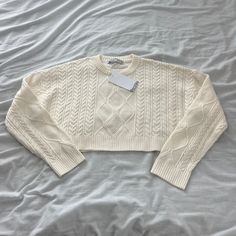 Bershka Knit Crop Sweater Size Small Condition: Nwt Color: White Details : - Sweater Knit - Comfy - Perfect With Any Bottoms Extra: - I Ship Between 1-2 Days Cropped Cable Knit Sweater With Crew Neck, Cable Knit Cropped Sweater With Crew Neck, Chic Cropped Cable Knit Sweater With Crew Neck, Chic Cable Knit Crew Neck Cropped Sweater, Winter White Crew Neck Pointelle Knit Sweater, Spring Cable Knit Cropped Sweater, Cream Cable Knit Cropped Sweater With Crew Neck, Cotton Cable Knit Cropped Sweater With Crew Neck, White Pointelle Knit Cropped Crew Neck Sweater