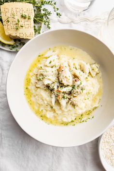 a white bowl filled with chicken and rice