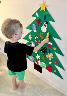 "Play Kiddo Christmas Tree!  Let your little one celebrate the season with their own Christmas tree! Made of top quality wool blend and 100% wool felt. Each tree comes with an assortment of 22+ ornaments including stockings that are customizable with your child's initials. ( Choose up to 2 initialed stockings with each additional stocking just a dollar each and will be in a separate post ). Fun for play year after year!  These trees also make GREAT gifts for those who can't make it home for the holidays and/or don't have the space for a big tree. They are perfect to send to a love one who may be deployed this holiday or a college student for their dorm! If you want to use the tree as decoration and would like them glued permanently to the tree please tell me in your notes!  Dimensions - H- Diy Kids Christmas Tree, Diy Felt Christmas, Toddler Christmas Tree, Trees For Kids, Diy Felt Christmas Tree, Christmas Trees For Kids, Felt Tree, Christmas Tree Set, Diy Toddler