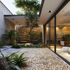 the interior of a modern house with stone flooring