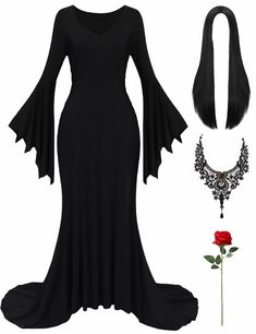 a black dress with long sleeves and a rose on the side, next to it's accessories