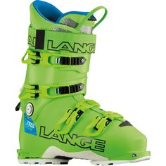 a pair of green ski boots sitting on top of a white floor