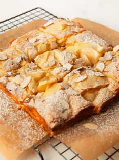 a pastry on a cooling rack with powdered sugar