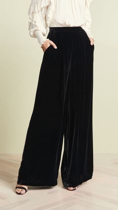 Wide leg black velvet pant for all size women, it has elastic at the back and straight belt at the front  ✨We stitched  outfit with lot of care, so that our customers should not have any issues regarding finishing and fitting.  Care instructions Gentle Hand wash Luxury Velvet Bottoms For Workwear, Plus Size Holiday Party Pants, Luxury Black Pants For Formal Occasions, Elegant Luxury Pants For Black-tie Events, Luxury Bohemian Black Bottoms, Luxury Black Palazzo Set For Reception, Luxury Black Palazzo Set For Wedding, Luxury Bollywood Velvet Palazzo Set, Luxury Velvet Wide Leg Bottoms