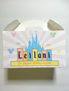 a birthday card with the name leilanii on it in front of a castle