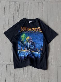 FOLLOW MY SHOP TO CHECK DAILY UPDATES & PRICE DROPS Vintage Megadeth Tee Shirt Size M P2P - 20'' Length - 27'' Shirt is in very good pre-owned condition Shipping options: - standard shipping in 7-15 days - priority in 3-5 business days (price will be more) Megadeth Shirt, Metal Band Tshirt, Metal Band Shirts, Punk Tee, Vintage Band T Shirts, Grunge Tee, Punk T Shirt, Metal T Shirts, Vintage Band Tees