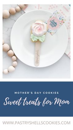 a mother's day cookie on a plate with the words sweet treats for mom