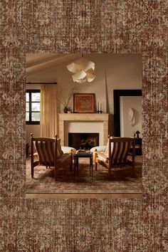 a living room filled with furniture and a fire place in the middle of a room