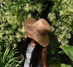 Our vintage sun hat is perfect for ultimate shading from harmful UV rays. Handmade using traditional artisan weaving technique.  Can look stylish and elegant. Is  adaptable for any occasion. Beach day,  traveling, gardening, fishing, or boating.  The color or size may differ slightly from photos as all products are handcrafted and make each piece unique and authentic. It's are one of the reasons we love them so much.  Size:  Circumference: 56cm-60cm Brim: 10cm  Note: This hat would be packed in Luxury Vintage Sun Hat For Beach, Straw Beach Hat, Tropical Retreat, Large Brim Hat, Gardening Hat, Straw Hat Beach, Ladies Hat, Boho Hat, Wide Brim Sun Hat