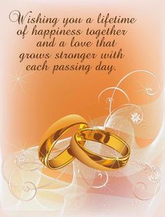 two gold wedding rings with the words wishing you a lifetime of happiness together and a love that grows younger with each passing day