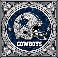 a stained glass window with the word cowboys on it and a football helmet in the center