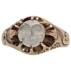 Rare Original Condition Victorian Man in the Moon Ring from the 19th Century in 14K gold. Original moonstone carved smiley face set high into pronged settings which give the appearance of sunburst with scrolls of clouds, hand engraved on shoulders of ring. Rare survival as rings of this sort were damaged if the wearer was wasnt careful as the moonstone cameo is mounted high. The adularescence (blue moon glow effect) comes from the upper left diagonally across the carving. Charming original Victo Weird Wedding Rings, Strange Rings, Victorian Wedding Band, Antique Mens Rings, Ring Styling, Magical Outfits, Victorian Man, Man In The Moon, Historical Jewellery