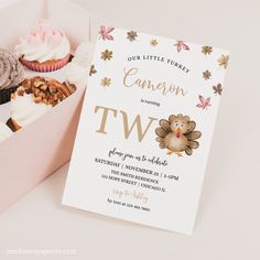 a little turkey birthday party with cupcakes in a pink box and a card