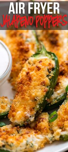 air fryer jalapeno poppers on a white plate with ranch dressing