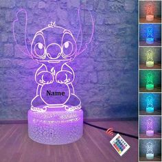 an image of a lamp that looks like a cartoon character with glowing colors on it