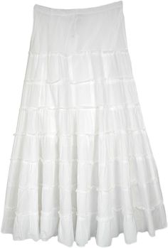 As white as snow, this lovely tiered cotton skirt is the perfect match for someone who likes a feminine yet comfortable style.  With its soft and gentle voile cotton fabric, the skirt has an eight-tiered look has an refined look and the skirt is lined up with the same fabric to the knee. #tlb #XLPlus #Misses #TieredSkirt #MaxiSkirt #Summerskirt #whiteskirt White Tiered Maxi Skirt For Spring, White Tiered Skirt With Gathered Details, White Ruffled Flared Maxi Skirt, Tiered Maxi Skirt With Layered Hem, White Ruffle Hem Long Skirt, White Tiered Gathered Maxi Skirt, White Ruffle Hem Skirt For Summer, White Flowy Tiered Maxi Skirt, White Maxi Skirt With Ruffle Hem