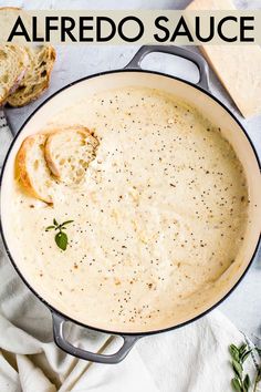 an image of a bowl of alfredo sauce with bread on the side and text overlay